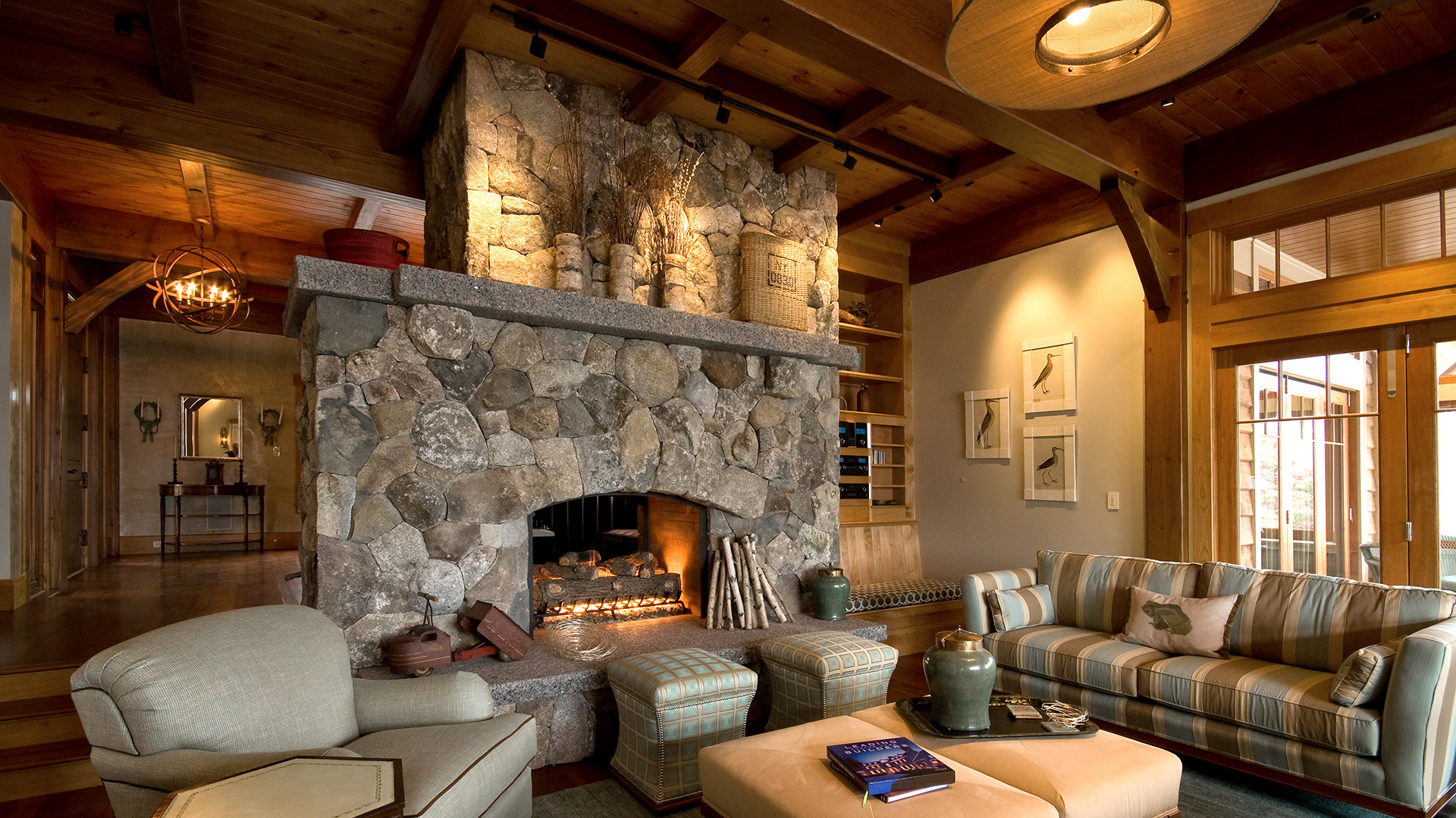 Lake Wentworth, New Hampshire post and beam living room with stone fireplace
